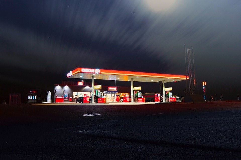 A well-maintained gas station at night time